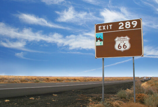 Historic Route 66 road sign between Gallup New Mexico and Flagstaff Arizona